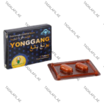 Yonggang Sex Power Tablet packaging box and tablets on white background